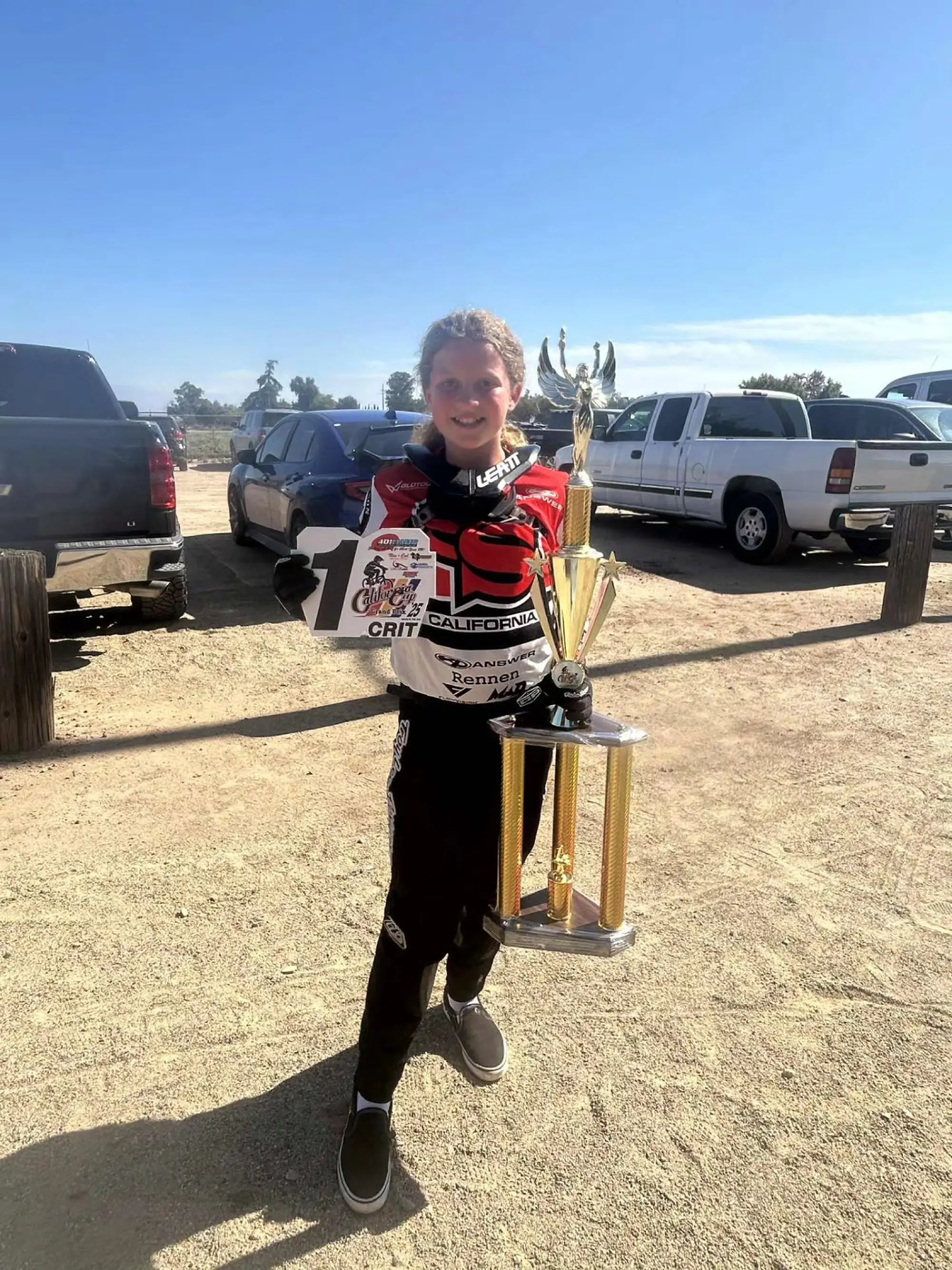 Young Cal Cup qualifiers at Airtime BMX holding their Golden Tickets